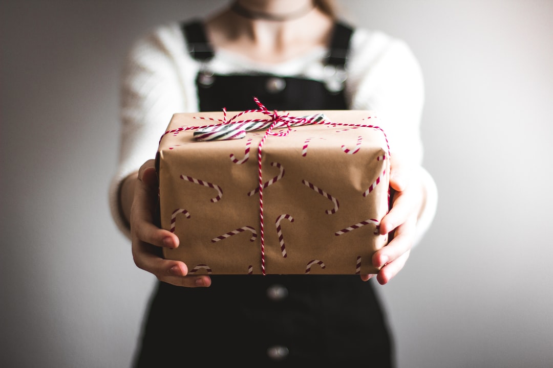 A lady holding gift